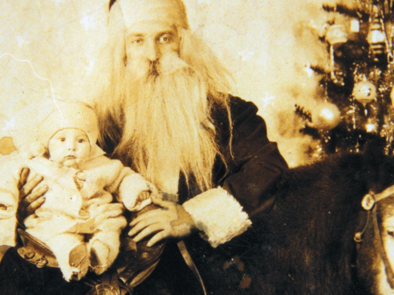 Baby Carl with Santa Claus.